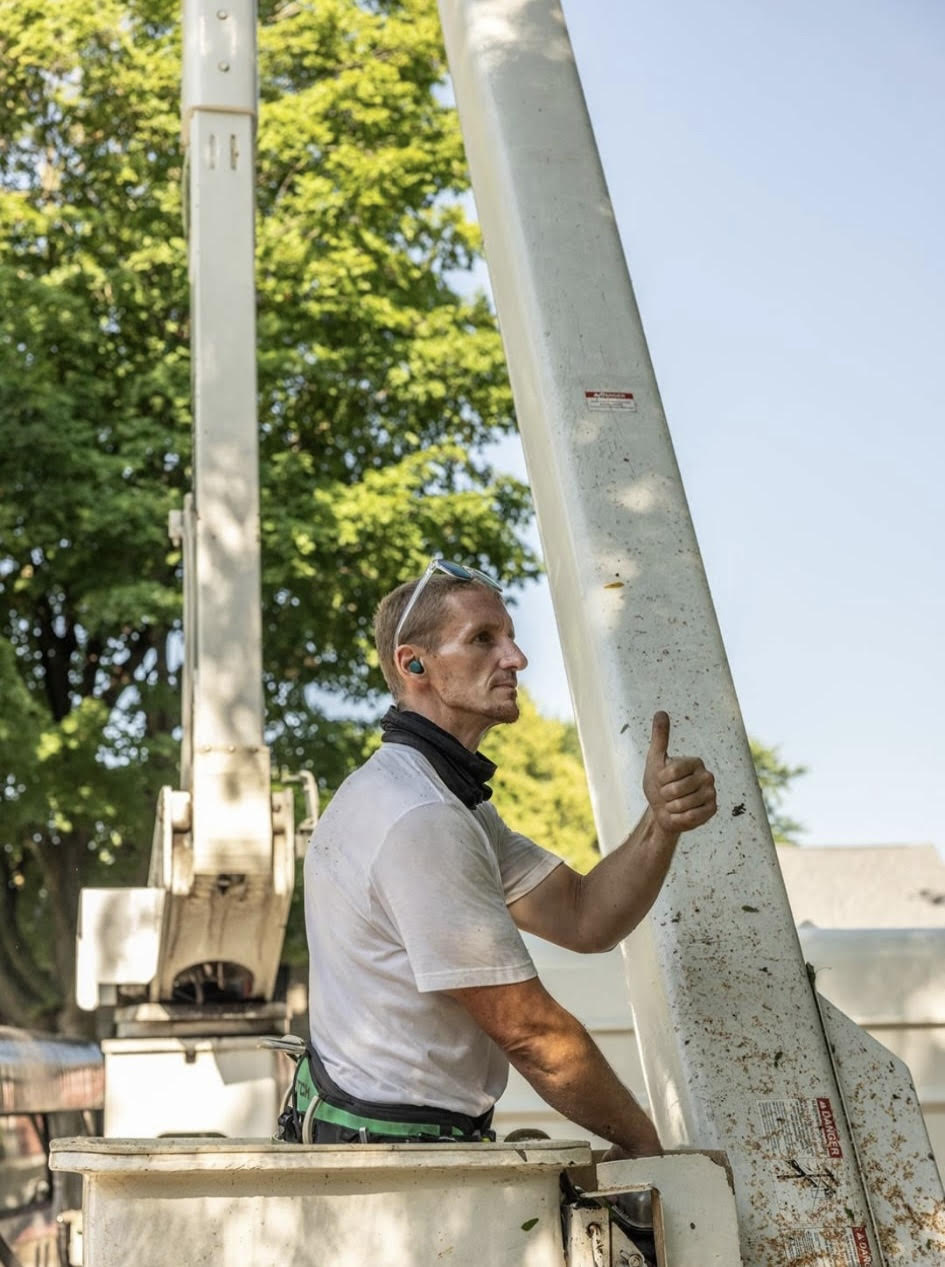 JC in the bucket truck
